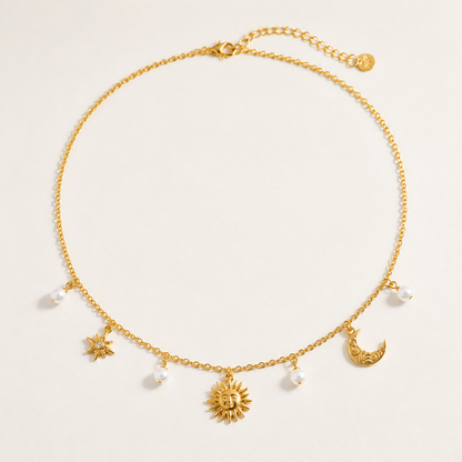 Collier Paris Merveilleuse Bijoux, chaîne fine dorée breloques soleil lune étoile nordique perles nacrées suspendues